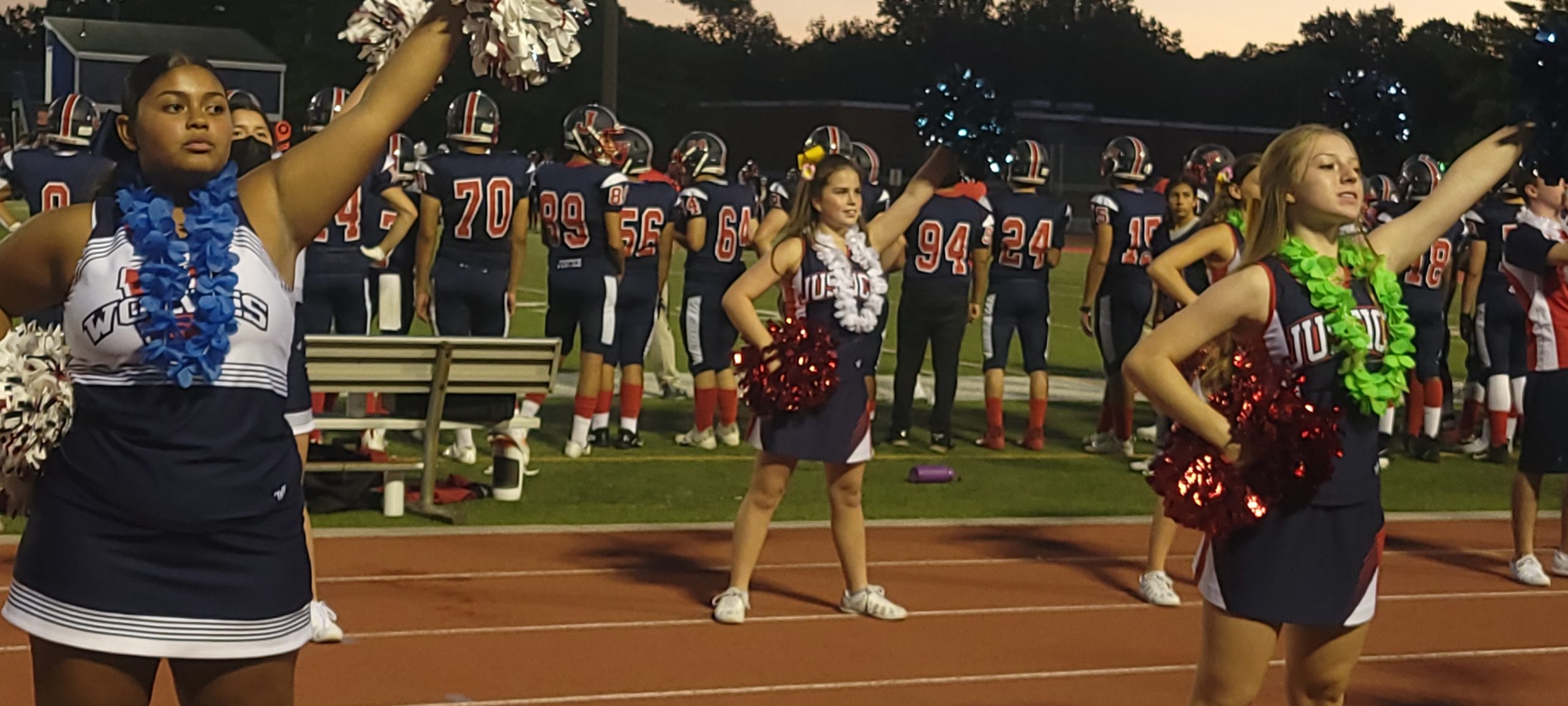 Justice Cheer Squad performing at a football game